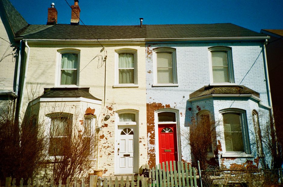 House exterior with a freshly painted wall